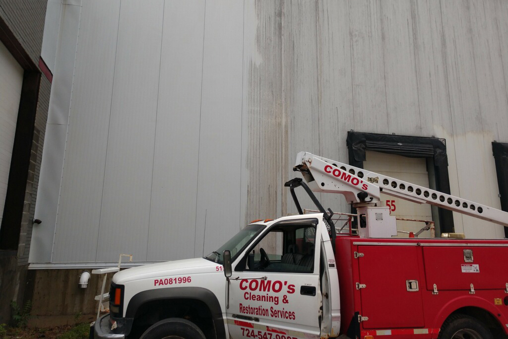 Como's service truck outside firehouse